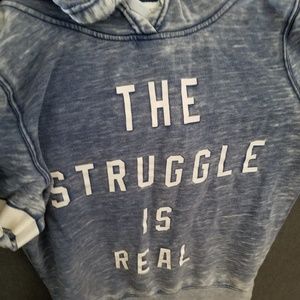 Light blue and white hoodie.